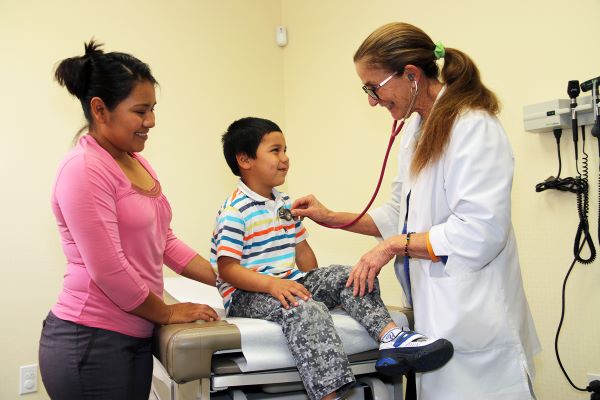 Mother and child at a doctor visit.